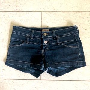 Dark wash jean shorts.